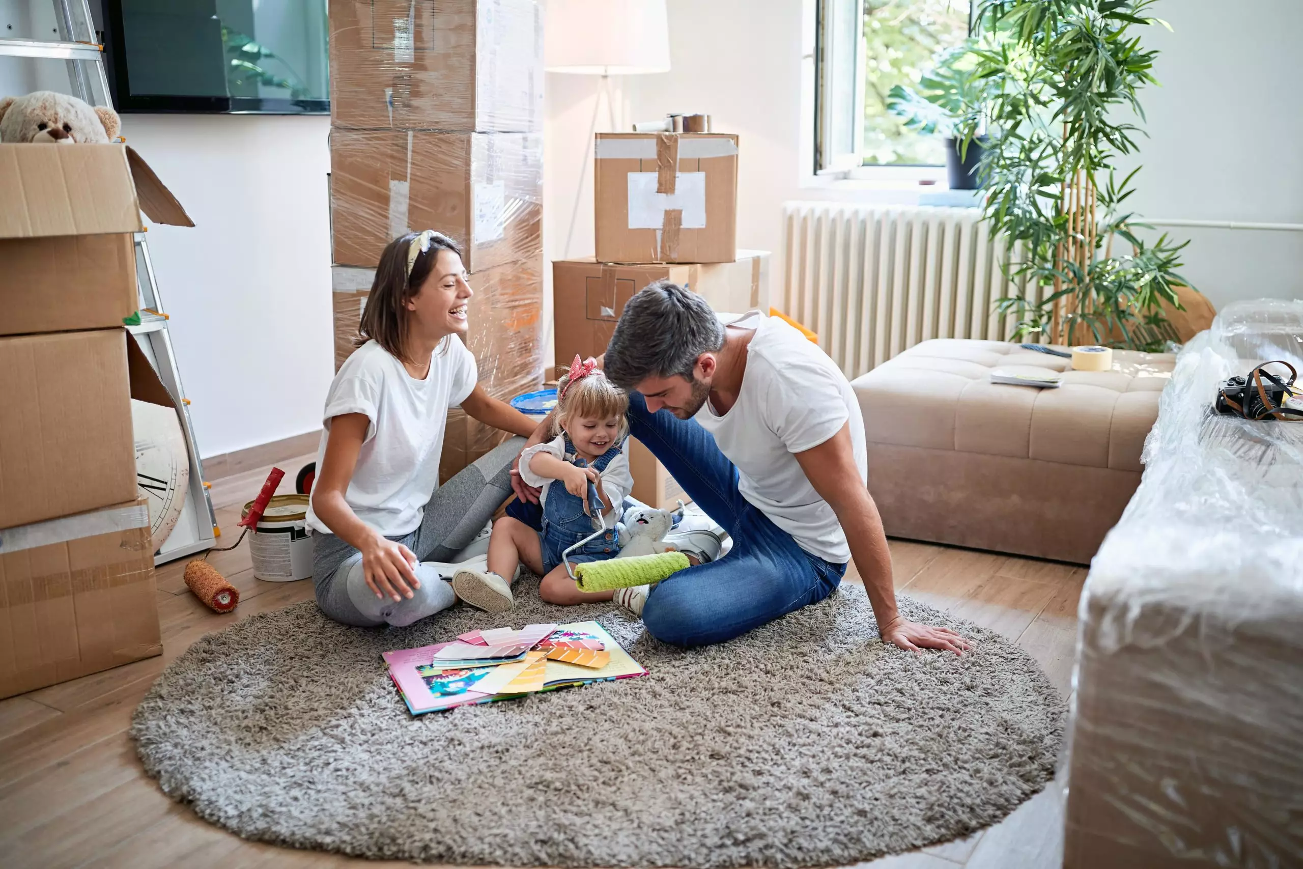 New home - Happy loving family in new apartment 